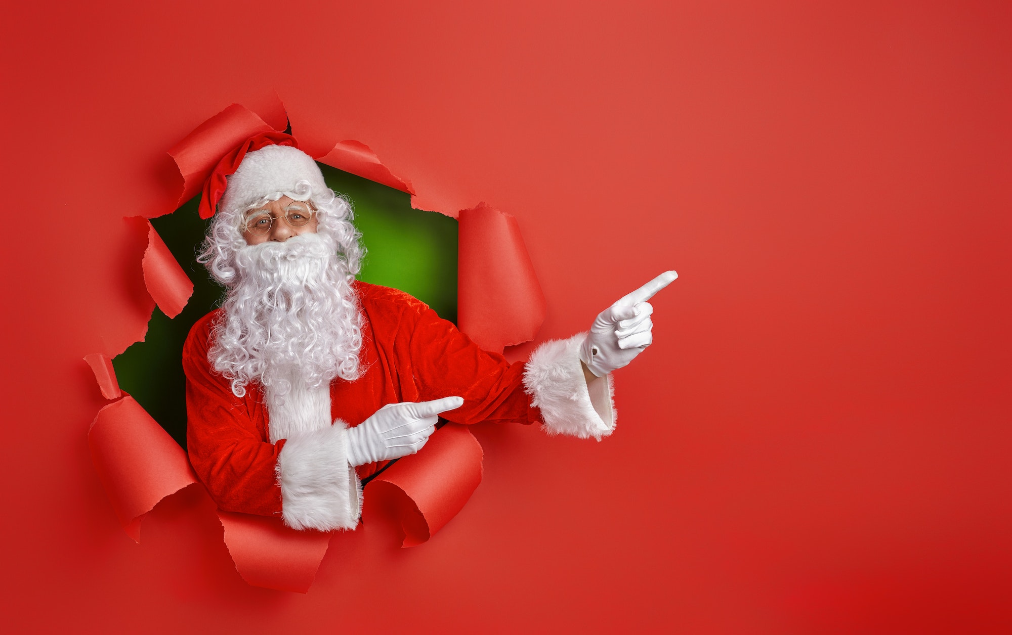 Santa Claus on color background.